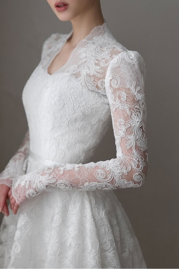 Elegant Long Sleeve Lace A-Line Wedding Dress with Sweep Train
