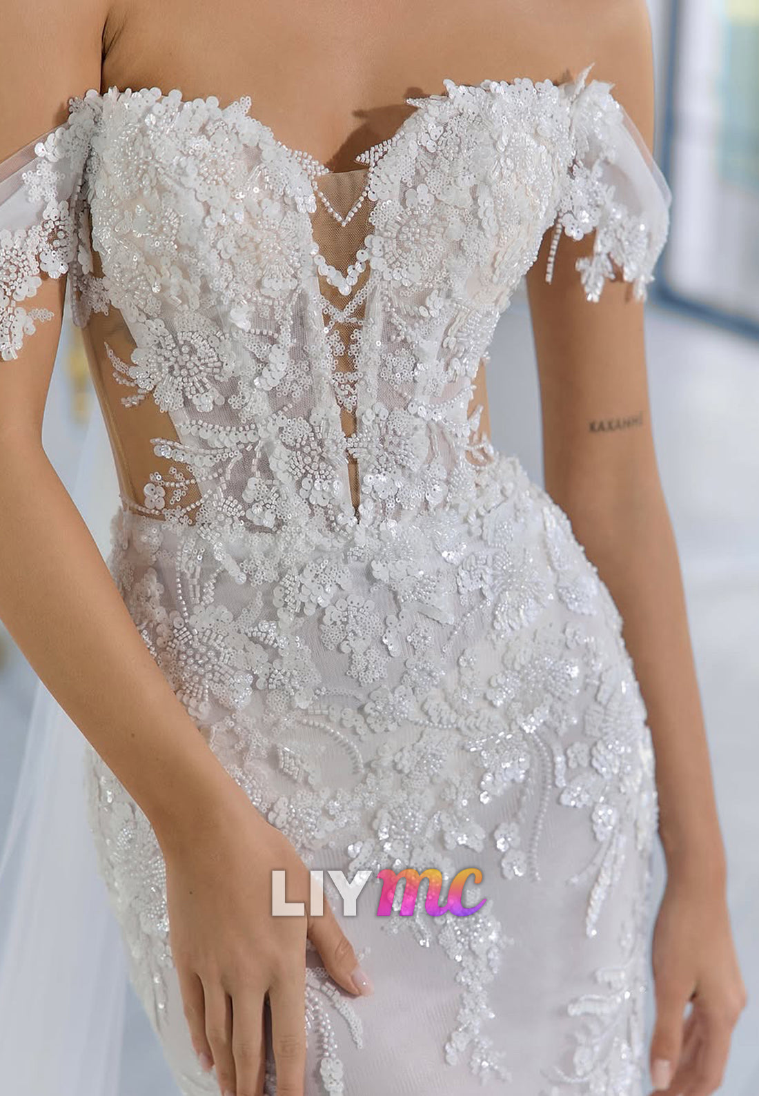 Off-Shoulder Sequins Appliques Mermaid Wedding Dress