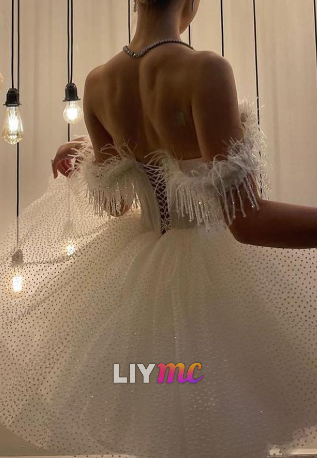 Sweetheart Sleeveless Beaded Fringe Tulle A-Line Wedding Dress