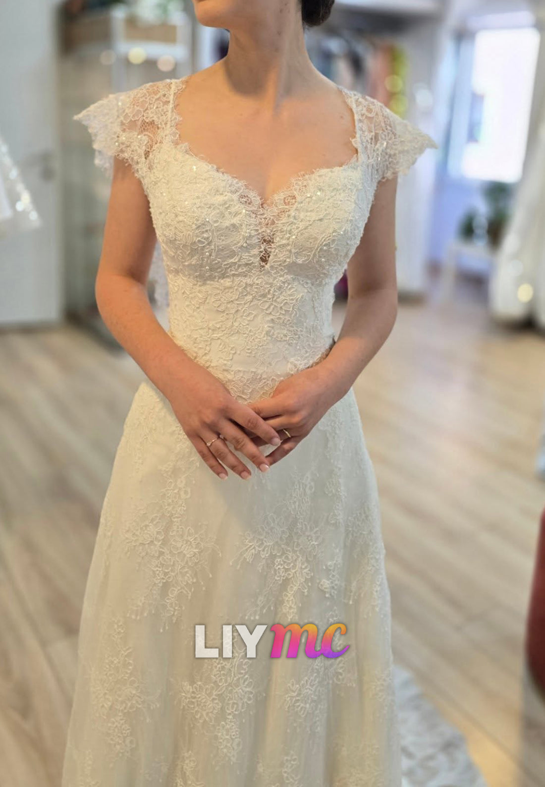 V-Neck Cap Sleeves Sequins Lace Appliques A-Line Wedding Dress