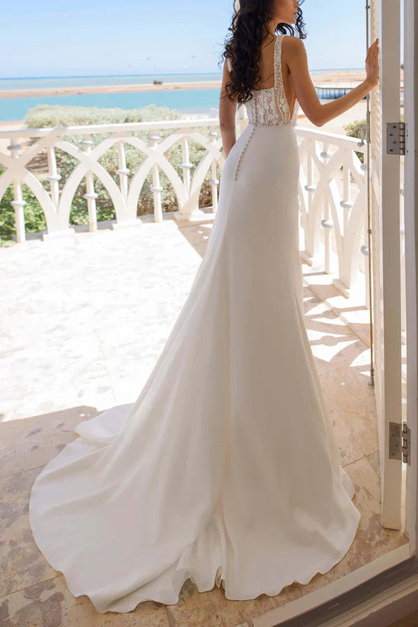 A unique square lace top with side slits and bohemian style wedding dress