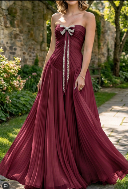 Strapless Pleated Evening Gown with Bow Accent