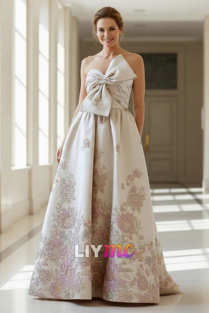 Ivory Strapless Brocade Floral Ball Gown With Bow Detail