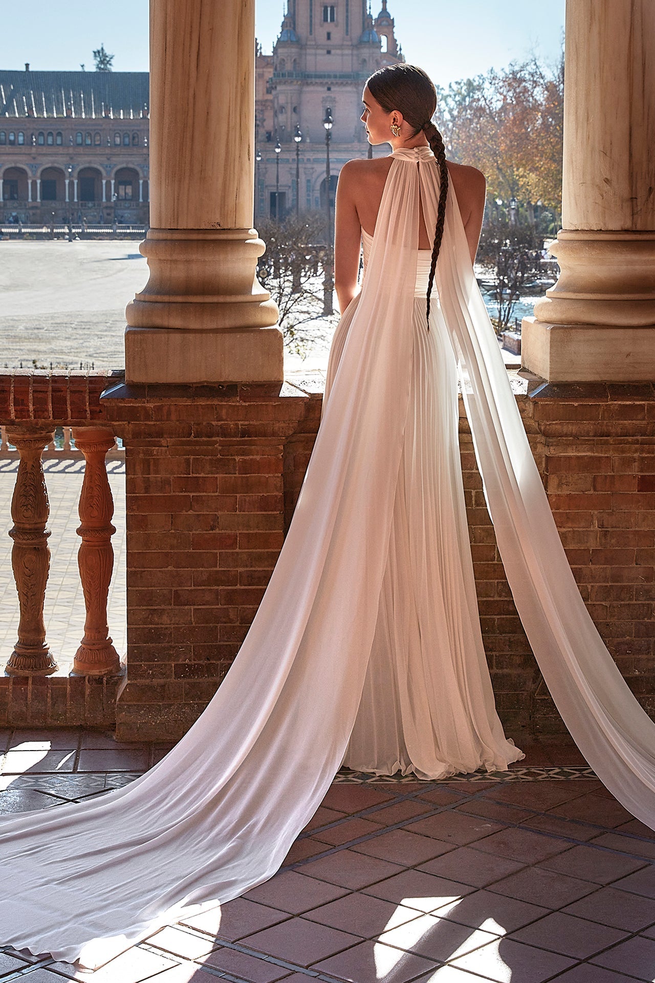 sleeveless wedding dress with pleats
