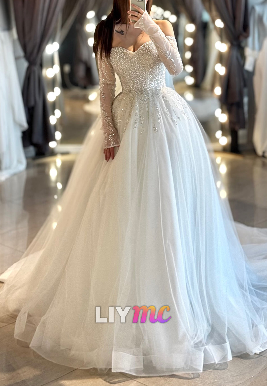 Sweetheart Beaded Long Sleeves Tulle Ball Gown Wedding Dress