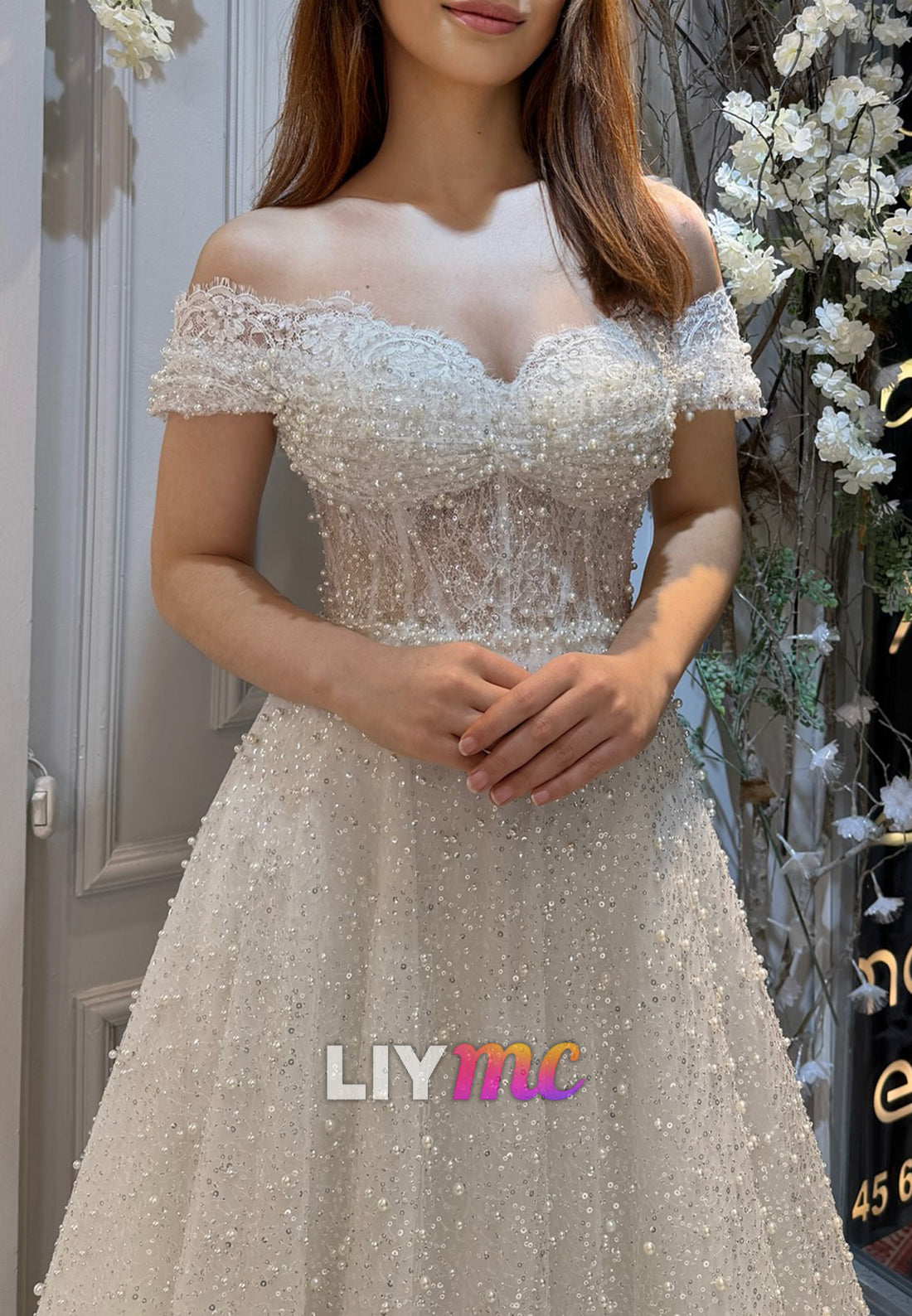 Sweetheart Sleeveless Beaded Embroidery Sparkly A-Line Wedding Dress