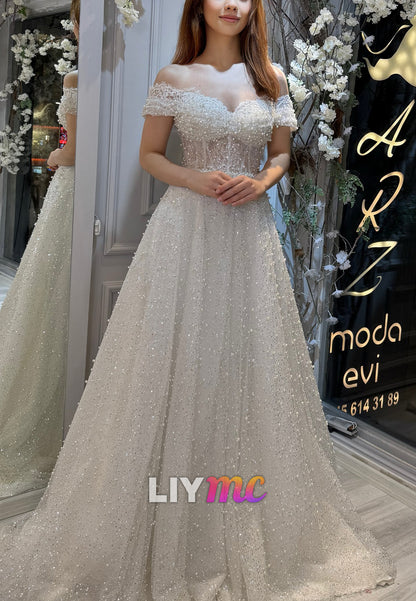Sweetheart Sleeveless Beaded Embroidery Sparkly A-Line Wedding Dress