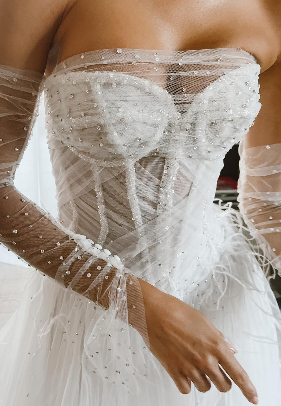 LW132 - A Line Strapless Sheer Pleated Tulle Feather Long Wedding Dress With Side Slit