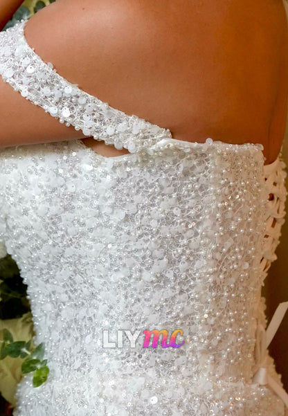 Off-Shoulder Pearl Mini Dress with Fringe
