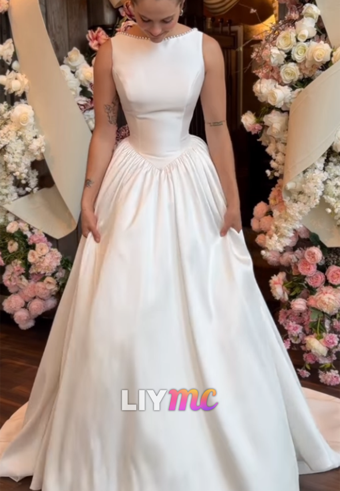 Sleeveless Satin Ball Gown with Beaded Neckline