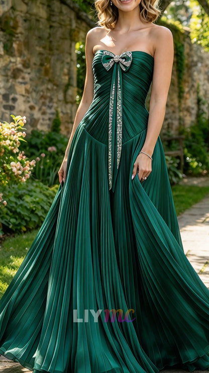 Strapless Pleated Evening Gown with Bow Accent