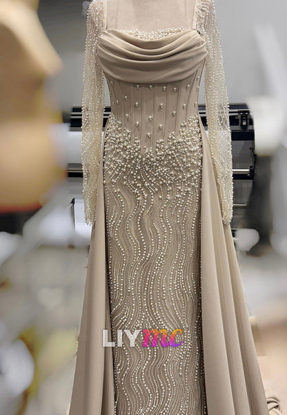 Pearl Beaded Mermaid Gown with Cape Overlay