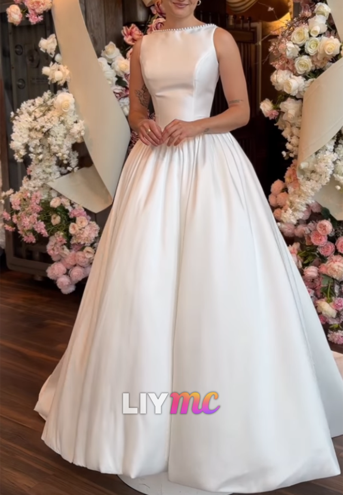 Sleeveless Satin Ball Gown with Beaded Neckline